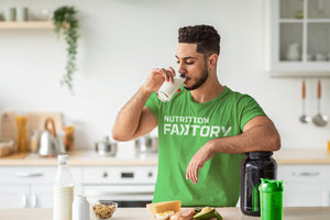 man drinking a protein shake