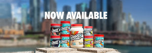 Assorted supplement capsules, a protein shake, and a balanced snack on a kitchen counter to illustrate managing hunger and cravings